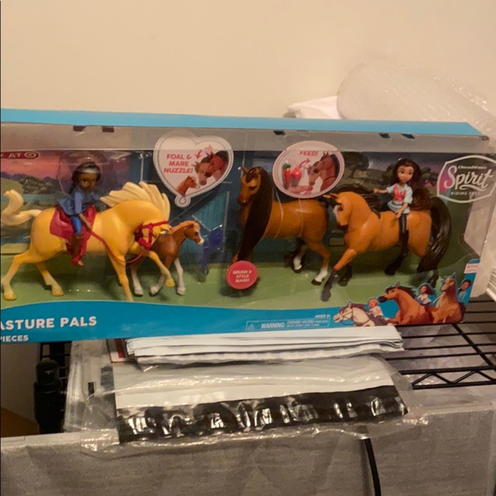 Dream works spirt riding free pasture pals new